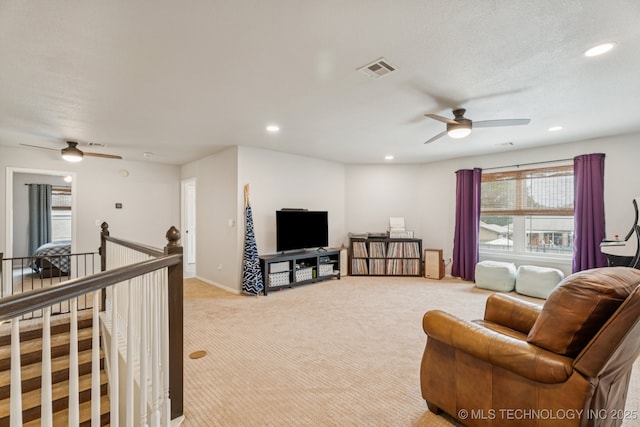 19804 E 45th St S, Broken Arrow, OK 74014 - living room with ceiling fan, light carpet, recessed lighting, and baseboards