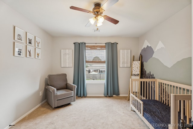 19804 E 45th St S, Broken Arrow, OK 74014 - carpeted bedroom featuring a nursery area, baseboards, and ceiling fan