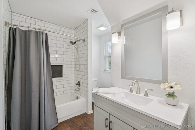 19804 E 45th St S, Broken Arrow, OK 74014 - full bath featuring wood finished floors, vanity, shower / tub combo, and toilet