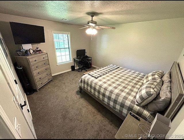 3109 Buffalo Ln, Grove, OK 74344 - bedroom featuring dark carpet, a textured ceiling, baseboards, and ceiling fan