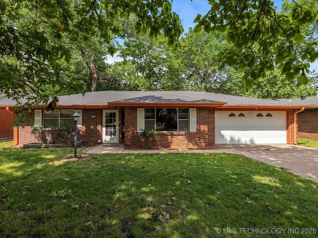 1921 S Santa Fe Pl, Bartlesville, OK 74003 - ranch-style home featuring an attached garage, brick siding, and a front lawn