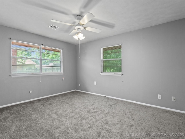 1921 S Santa Fe Pl, Bartlesville, OK 74003 - unfurnished room featuring carpet floors and a ceiling fan