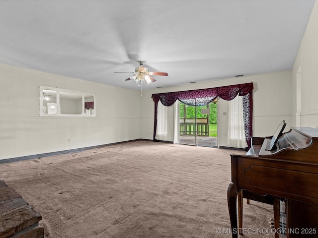 512 W 20th, Bartlesville, OK 74003 - carpeted living area with a ceiling fan