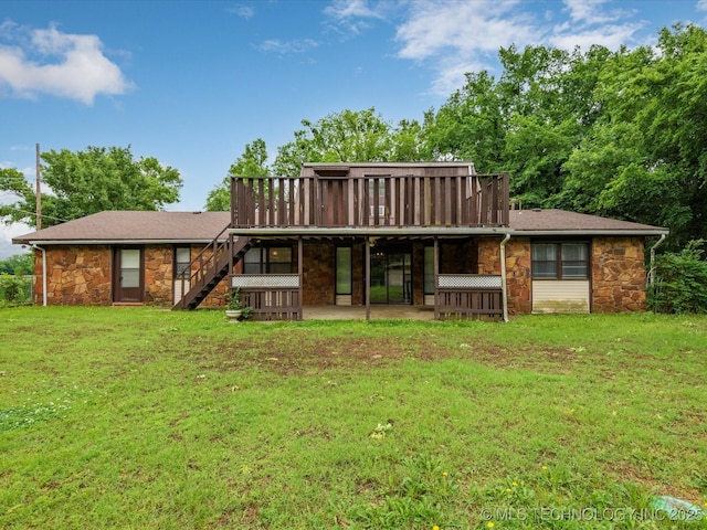 512 W 20th, Bartlesville, OK 74003 - back of house featuring stone siding, stairs, a patio, and a yard