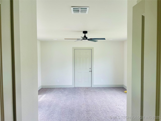 305 E Hickory Ave, Fort Gibson, OK 74434 - carpeted empty room featuring ceiling fan and baseboards