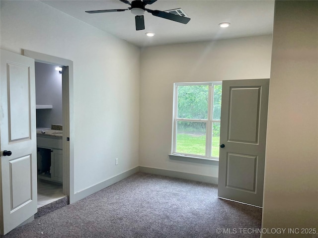 305 E Hickory Ave, Fort Gibson, OK 74434 - unfurnished bedroom with carpet floors, baseboards, and ensuite bathroom