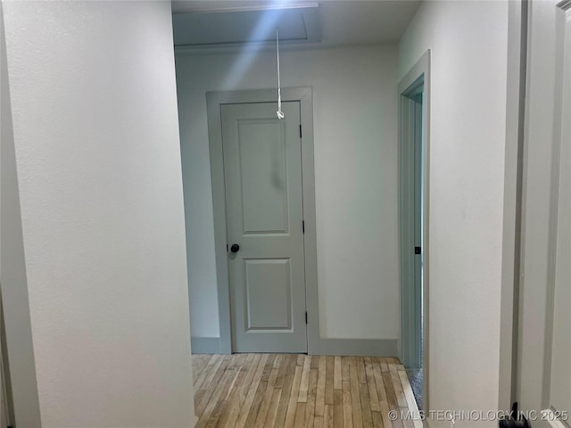 305 E Hickory Ave, Fort Gibson, OK 74434 - hall featuring light wood-style flooring and attic access