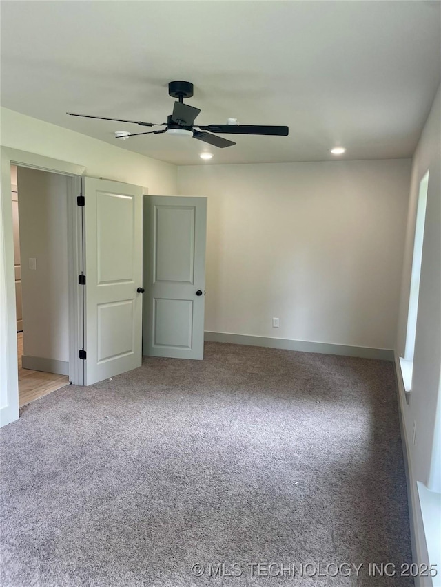 305 E Hickory Ave, Fort Gibson, OK 74434 - unfurnished bedroom featuring carpet floors, baseboards, ceiling fan, and recessed lighting