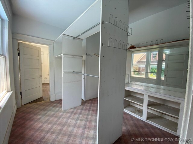 1501 E Okmulgee St, Muskogee, OK 74403 - spacious closet featuring carpet flooring