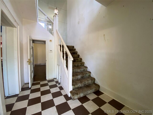 1501 E Okmulgee St, Muskogee, OK 74403 - staircase featuring tile patterned floors