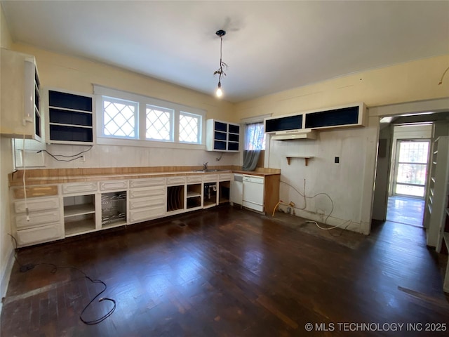 1501 E Okmulgee St, Muskogee, OK 74403 - kitchen with open shelves, dark wood-style flooring, a sink, dishwasher, and pendant lighting