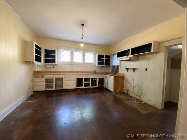1501 E Okmulgee St, Muskogee, OK 74403 - kitchen featuring dark wood-style flooring, open shelves, pendant lighting, and a sink