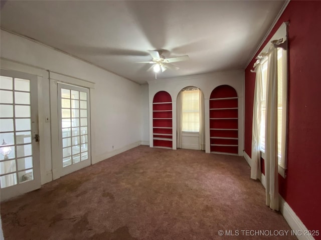 1501 E Okmulgee St, Muskogee, OK 74403 - carpeted spare room with ceiling fan, ornamental molding, and baseboards