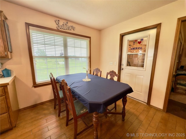 5401 N 435th Rd, Adair, OK 74330 - dining room with light wood-style flooring and baseboards