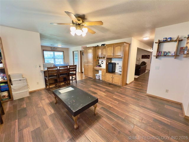 5401 N 435th Rd, Adair, OK 74330 - living area with a ceiling fan, dark wood-style floors, and baseboards