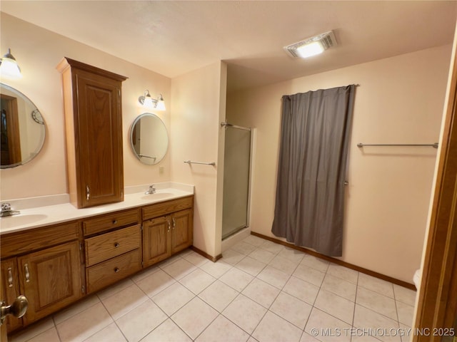 5401 N 435th Rd, Adair, OK 74330 - full bathroom featuring double vanity, an enclosed shower, baseboards, and tile patterned floors