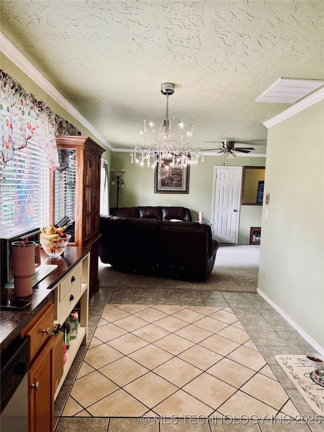 14009 S 295th E Ave, Coweta, OK 74429 - dining room featuring ornamental molding, light tile patterned floors, a textured ceiling, ceiling fan, and a chandelier