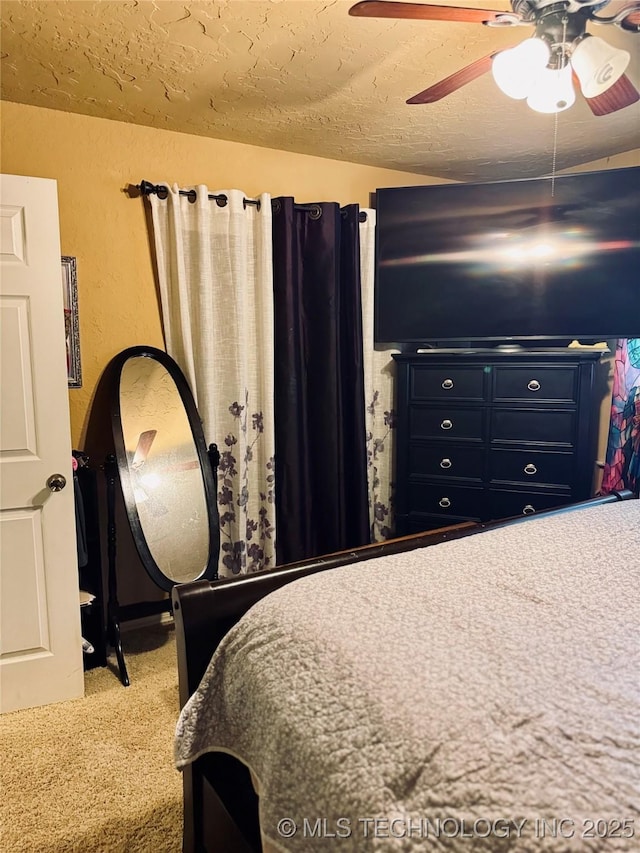 14009 S 295th E Ave, Coweta, OK 74429 - bedroom with carpet flooring, a ceiling fan, a textured wall, and a textured ceiling
