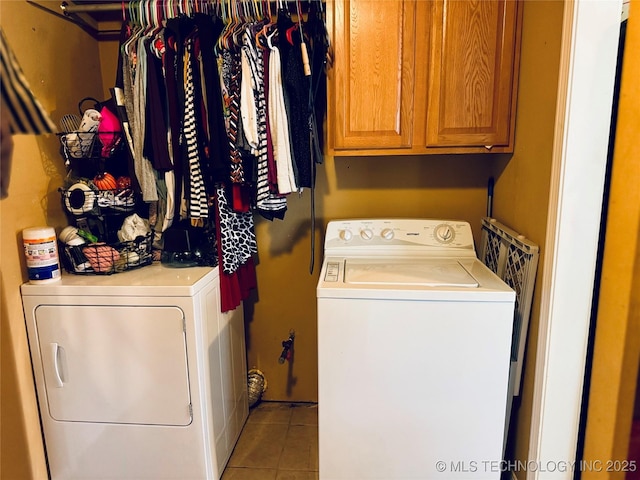 14009 S 295th E Ave, Coweta, OK 74429 - laundry area featuring separate washer and dryer, light tile patterned flooring, and cabinet space