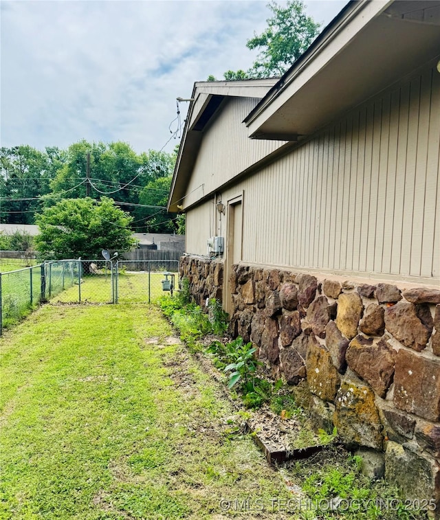 14009 S 295th E Ave, Coweta, OK 74429 - view of property exterior featuring stone siding