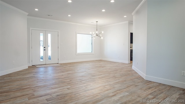 1223 Buckingham, Ardmore, OK 73401 - foyer entrance featuring crown molding, a chandelier, light wood-style flooring, recessed lighting, and baseboards