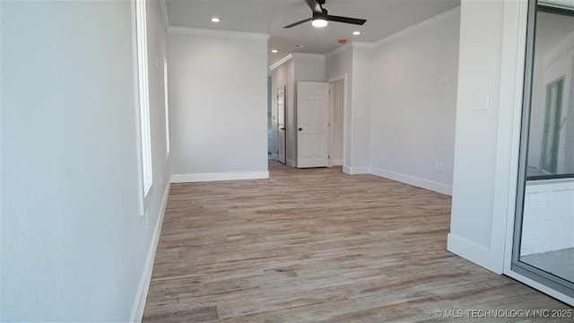 1223 Buckingham, Ardmore, OK 73401 - unfurnished room with ornamental molding, baseboards, light wood finished floors, ceiling fan, and recessed lighting