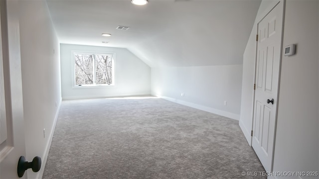 1223 Buckingham, Ardmore, OK 73401 - bonus room with carpet, lofted ceiling, baseboards, and recessed lighting
