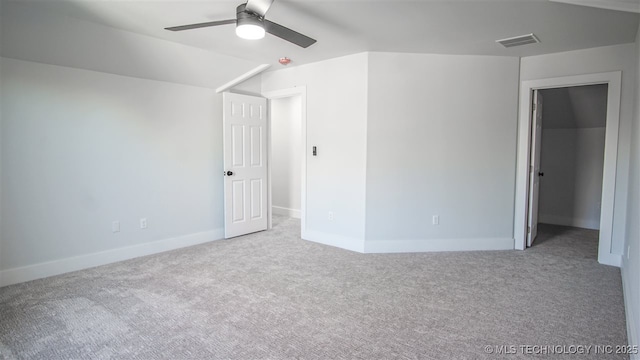1223 Buckingham, Ardmore, OK 73401 - unfurnished bedroom with carpet, baseboards, a spacious closet, and a ceiling fan