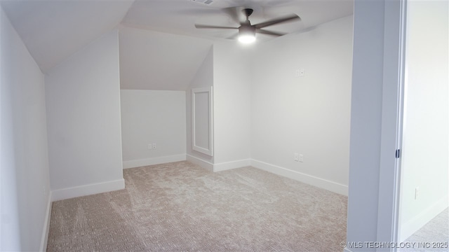 1223 Buckingham, Ardmore, OK 73401 - bonus room with ceiling fan, carpet, vaulted ceiling, and baseboards