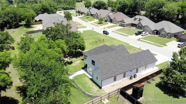 1223 Buckingham, Ardmore, OK 73401 - aerial perspective of suburban area featuring a tree filled landscape