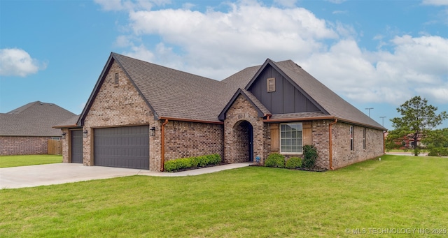2621 S Catalayah Ln, Claremore, OK 74019 - view of front of property featuring a garage, brick siding, and a front yard