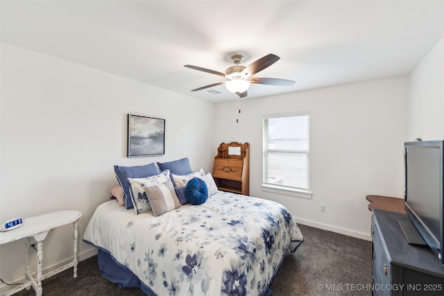 2621 S Catalayah Ln, Claremore, OK 74019 - bedroom featuring dark colored carpet, baseboards, and a ceiling fan