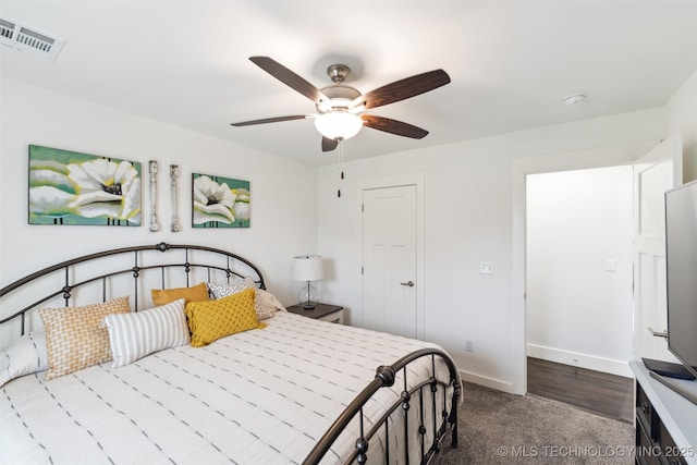 2621 S Catalayah Ln, Claremore, OK 74019 - bedroom featuring dark carpet, baseboards, and ceiling fan