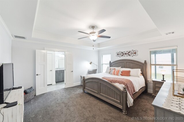 2621 S Catalayah Ln, Claremore, OK 74019 - bedroom with a tray ceiling, ornamental molding, carpet floors, baseboards, and ceiling fan