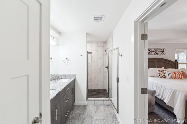 2621 S Catalayah Ln, Claremore, OK 74019 - ensuite bathroom with marble finish floors, a shower stall, double vanity, and baseboards