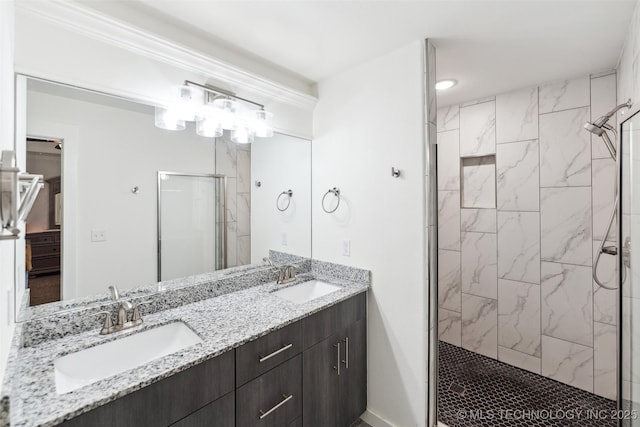 2621 S Catalayah Ln, Claremore, OK 74019 - bathroom featuring a shower stall and double vanity