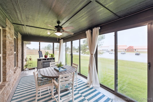2621 S Catalayah Ln, Claremore, OK 74019 - sunroom / solarium featuring a ceiling fan and a water view