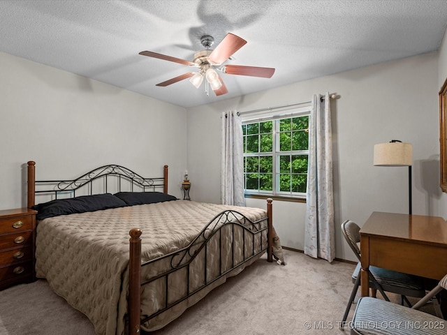 1800 SE Polaris Dr, Bartlesville, OK 74006 - bedroom featuring light carpet and a ceiling fan