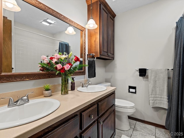 1800 SE Polaris Dr, Bartlesville, OK 74006 - full bath with double vanity, tile patterned floors, and curtained shower