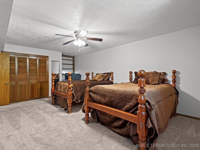 1800 SE Polaris Dr, Bartlesville, OK 74006 - bedroom with carpet flooring and a ceiling fan