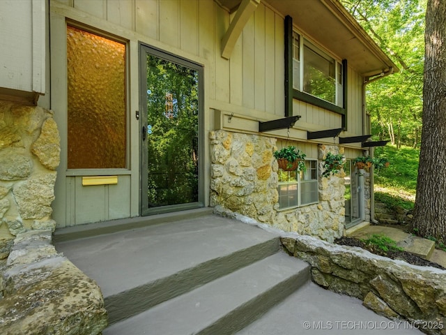 1800 SE Polaris Dr, Bartlesville, OK 74006 - property entrance featuring stone siding