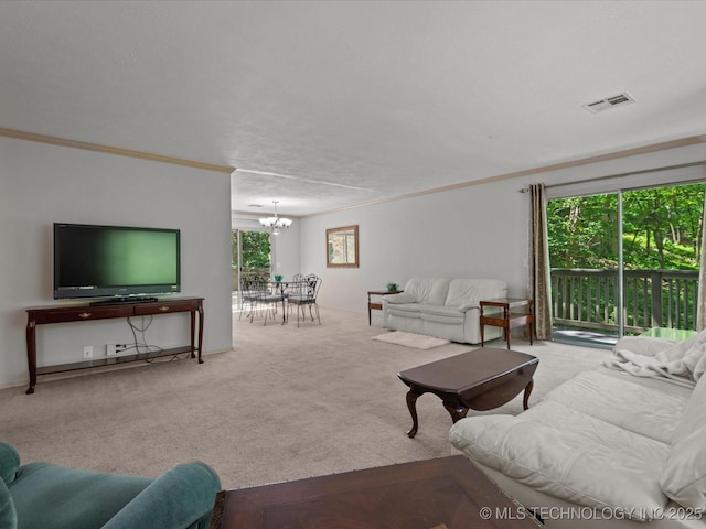 1800 SE Polaris Dr, Bartlesville, OK 74006 - living room featuring a chandelier, carpet, and crown molding