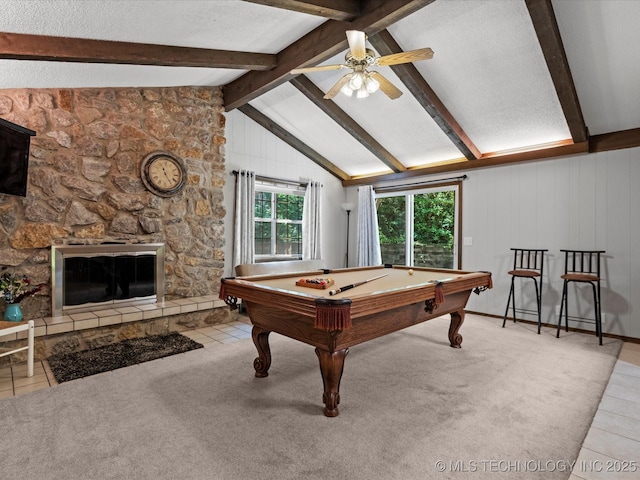 1800 SE Polaris Dr, Bartlesville, OK 74006 - playroom with billiards table, ceiling fan, a stone fireplace, and tile patterned floors