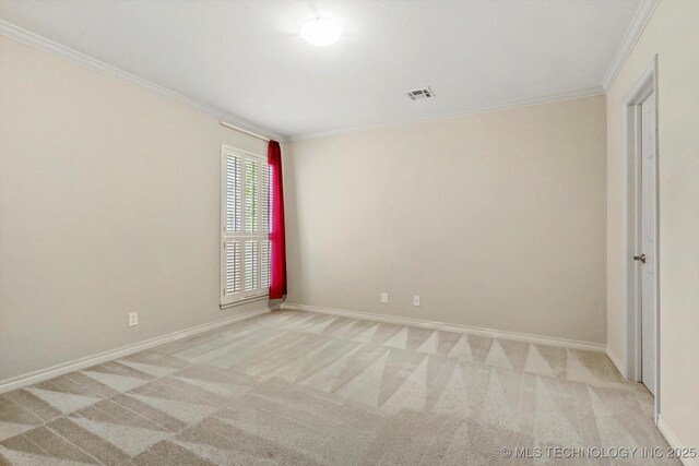 9926 S 79th E Ave, Tulsa, OK 74133 - spare room with ornamental molding, light carpet, and baseboards