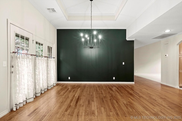 9926 S 79th E Ave, Tulsa, OK 74133 - unfurnished dining area with wood finished floors, a chandelier, ornamental molding, and baseboards