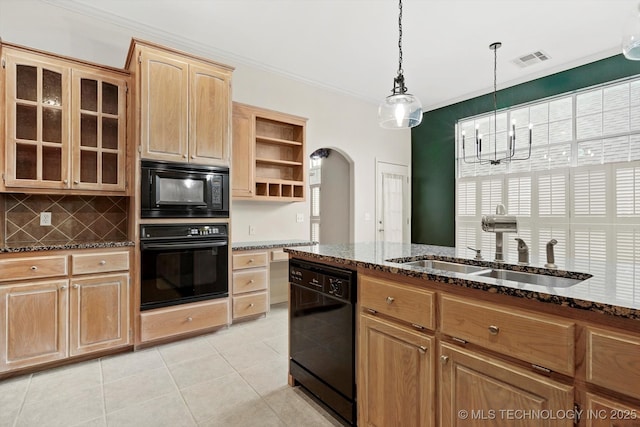 9926 S 79th E Ave, Tulsa, OK 74133 - kitchen featuring black appliances, arched walkways, dark stone countertops, light tile patterned flooring, and open shelves