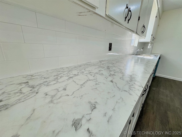 26037 S 520th Rd, Park Hill, OK 74451 - kitchen featuring decorative backsplash, a sink, baseboards, and light stone countertops