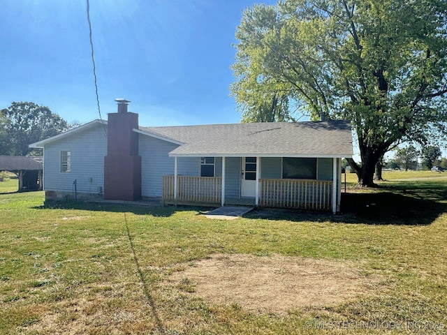 26037 S 520th Rd, Park Hill, OK 74451 - back of house with covered porch, a yard, and a chimney
