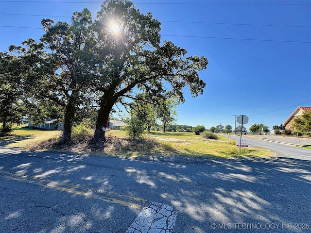 26037 S 520th Rd, Park Hill, OK 74451 - view of asphalt road with traffic signs