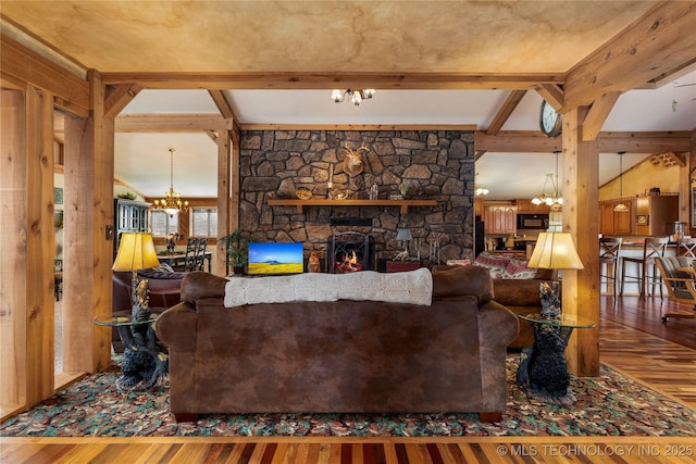 31401 S 620th Rd, Grove, OK 74344 - living area with a chandelier, wood-type flooring, a fireplace, and beam ceiling
